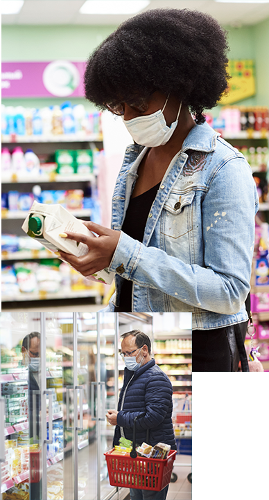 two people food shopping wearing masks