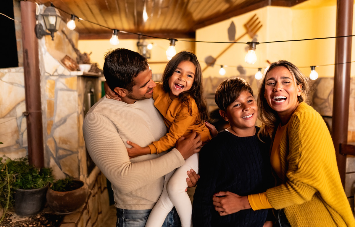 Latino family enjoying time in a restaurant