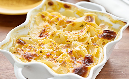 Scalloped Potatoes in a serving dish