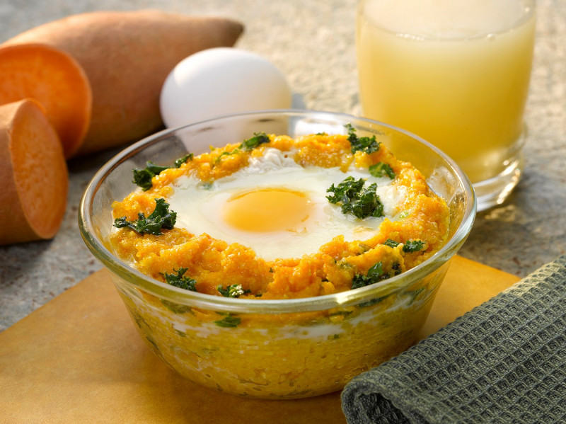 bowl of Eggs over Kale and Sweet Potato Grits