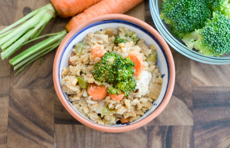 Fried rice topped with vegetables in a bowl