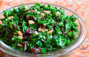 Kale with Nuts and Raisins on a plate