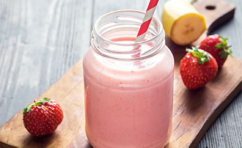 container full of Strawberry and Banana Fruit Smoothie