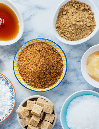 sugar and honey in bowls