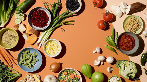 Vegetable foods spread out on a table