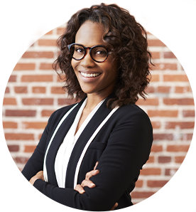 young professional black woman wearing black suit and glasses