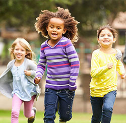 3 young kids running