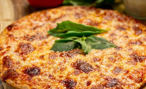 Rice-Crusted Pizza on a pan