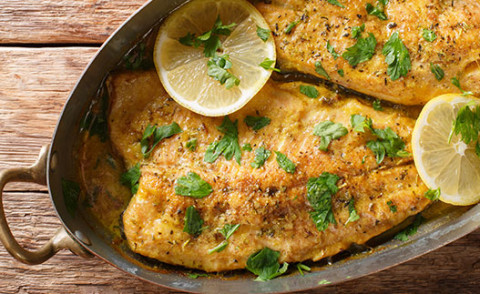 Mouth-Watering Oven-Fried Fish in a skillet