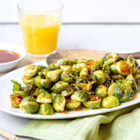 image of Orange and Honey Glazed Brussel Sprouts on a plate