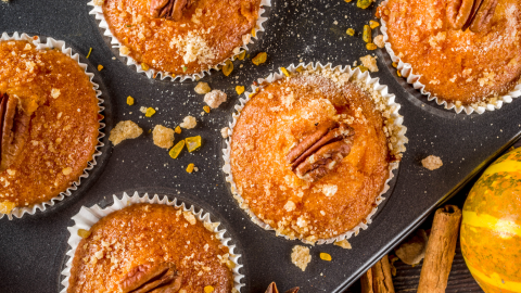 Image of Cinnamon Sugared Pumpkin Pecan Muffins Recipe in a muffin pan.