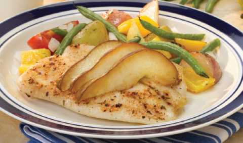 plate of Easy Oven Packet Caribbean Tilapia with Pears and Carnival Roasted Potatoes