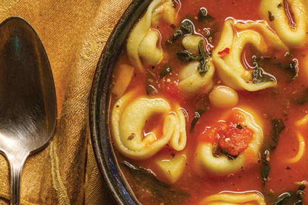 image of tortellini soup in a bowl
