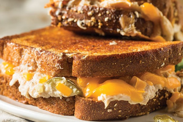 image of tuna melt burger on a plate