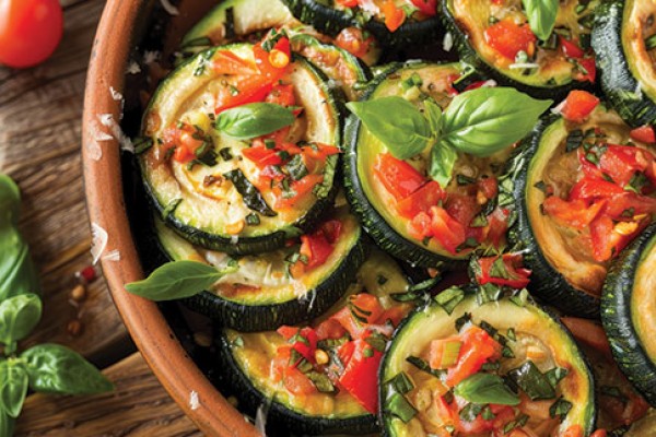 image of zucchini and tomatoes in a serving dish