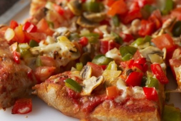 Image of Veggie Pizza Pita Pockets recipe on a plate.