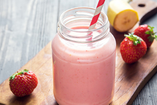 container full of Strawberry and Banana Fruit Smoothie