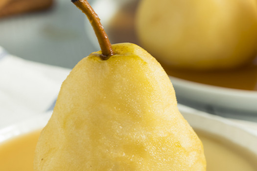 Pear in Orange Sauce on a plate