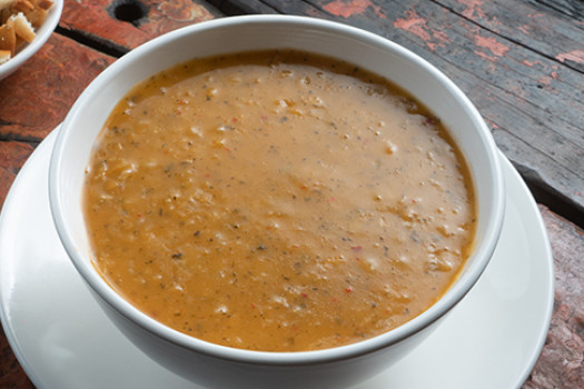 Shorba (Lamb and Peanut Soup) in a bowl