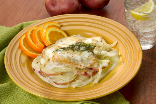 Scalloped Potatoes and Chicken with Fennel on a plate