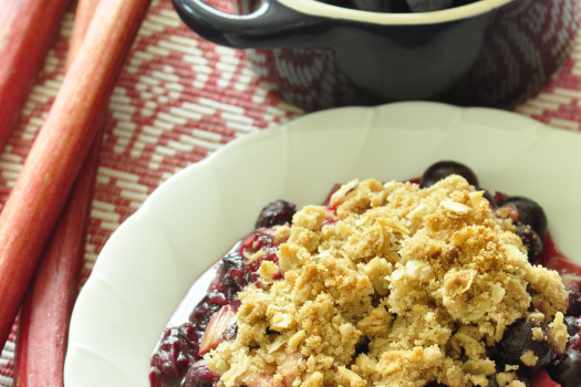 rhubarb blueberry crisp on a plate