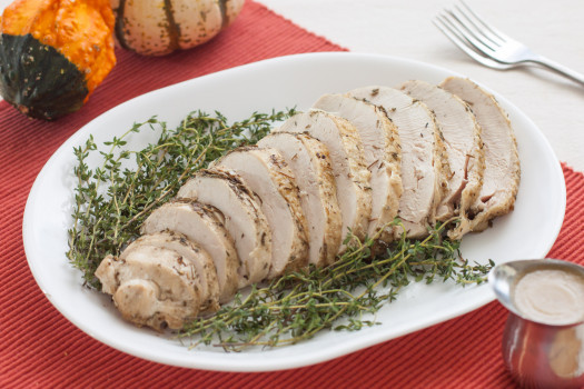 Roast Turkey Breast with Rosemary, Sage, and Thyme on a serving dish