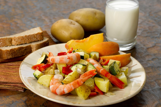 Yellow Potato and Red Pepper Shrimp Sauté on a plate