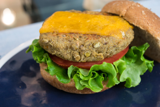 Tastee Burger with cheese on top