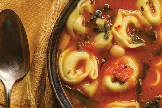image of tortellini soup in a bowl