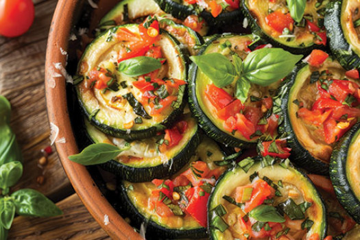 image of zucchini and tomatoes in a serving dish