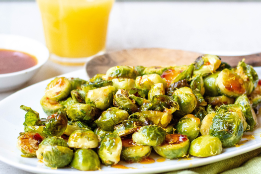 image of Orange and Honey Glazed Brussel Sprouts on a plate