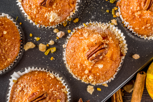 Image of Cinnamon Sugared Pumpkin Pecan Muffins Recipe in a muffin pan.