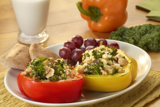 Rainbow Bell Pepper Boats with Garbanzo Beans and Kale on a plate