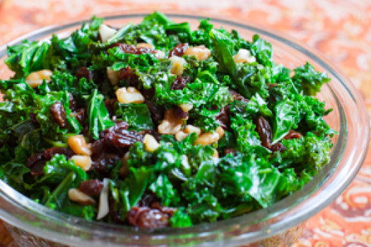 Kale with Nuts and Raisins on a plate