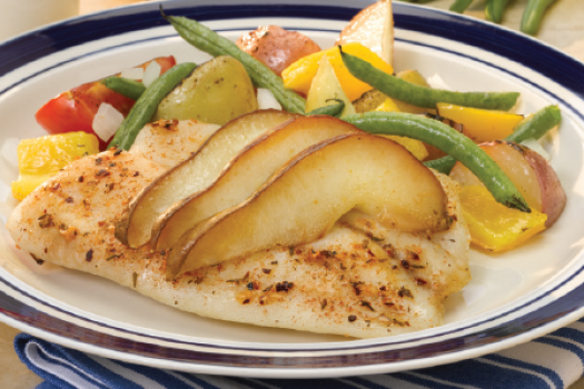 plate of Easy Oven Packet Caribbean Tilapia with Pears and Carnival Roasted Potatoes