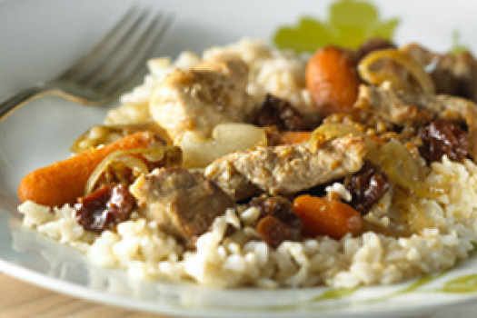 Slow Cooker Pork Stew over Brown Rice on a plate