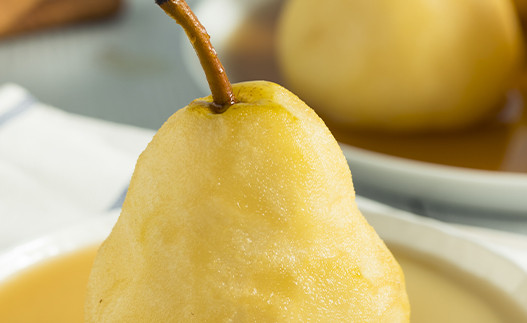 Pear in Orange Sauce on a plate