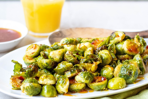 image of Orange and Honey Glazed Brussel Sprouts on a plate