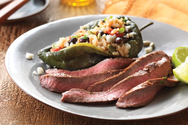 image of Lime-Marinated Flank Steak with Stuffed Poblano Peppers on a plate